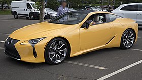 2019 Lexus LC500 (yellow), front left (Greenwich 2019).jpg